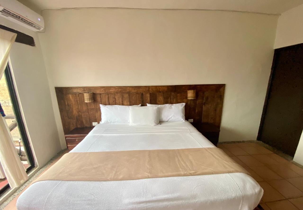 Casa Caribe カンクン エクステリア 写真 A bedroom at the hotel
