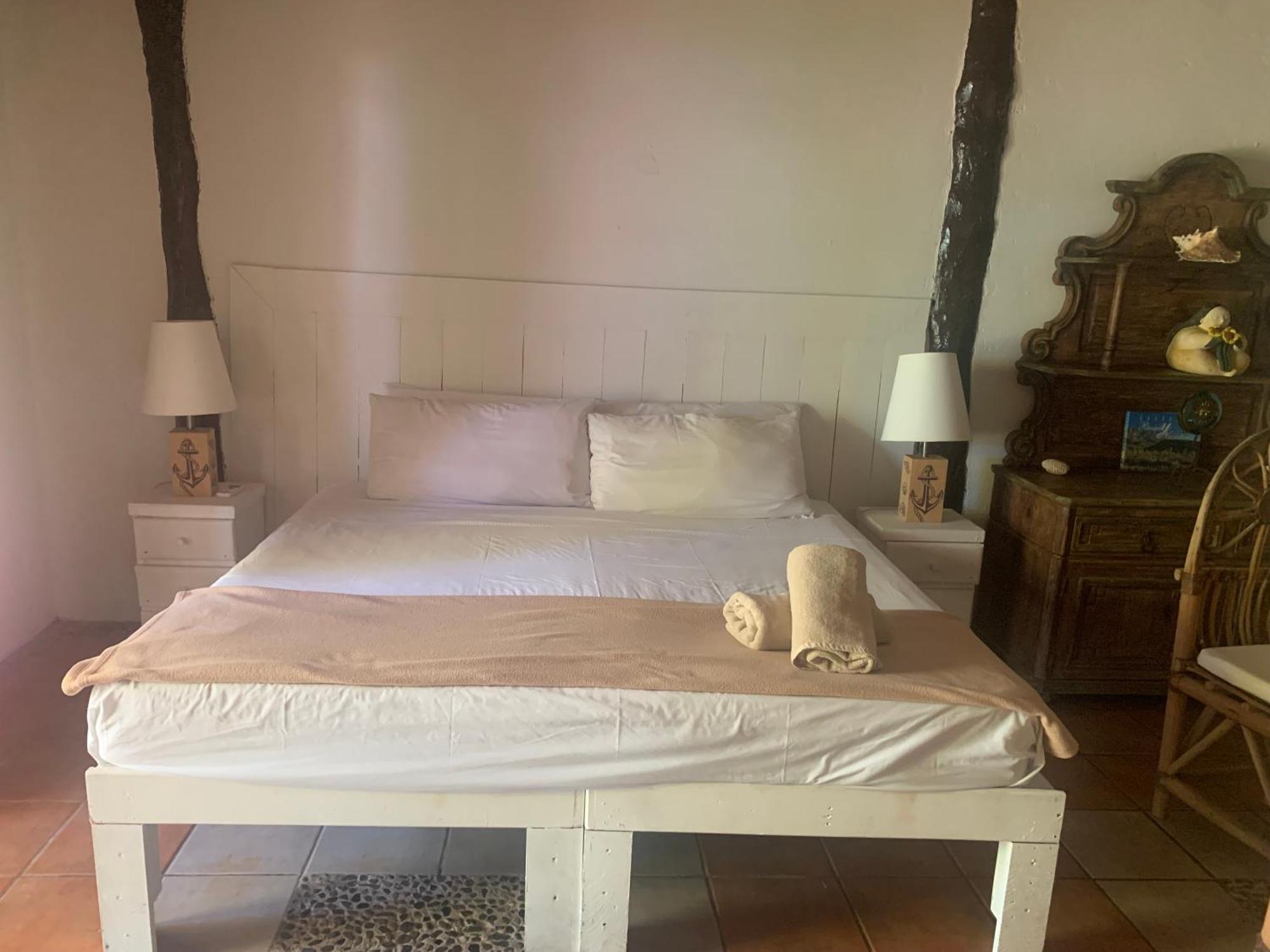 Casa Caribe カンクン エクステリア 写真 A bedroom at the hotel