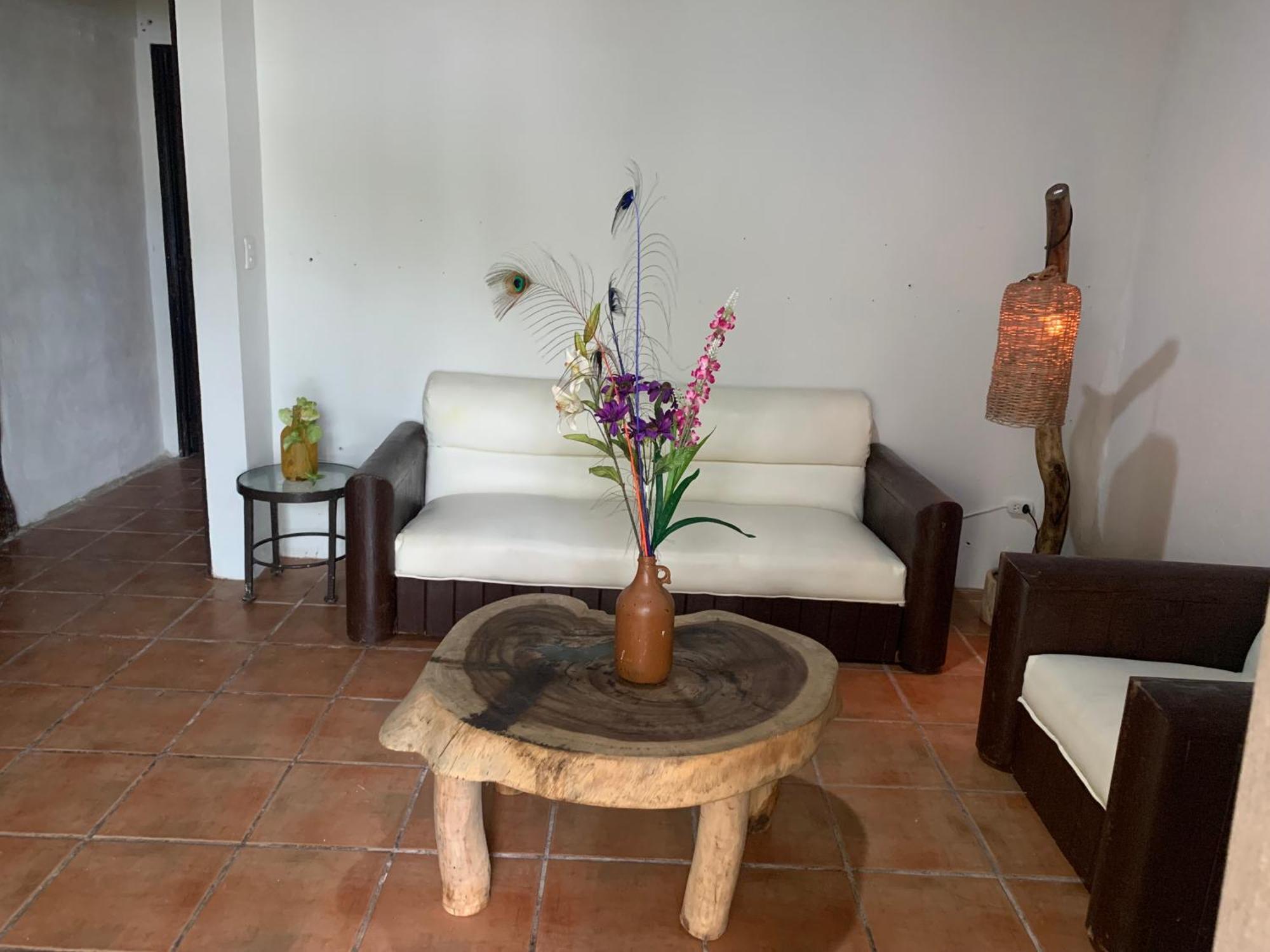 Casa Caribe カンクン エクステリア 写真 A living room in a typical house in the community